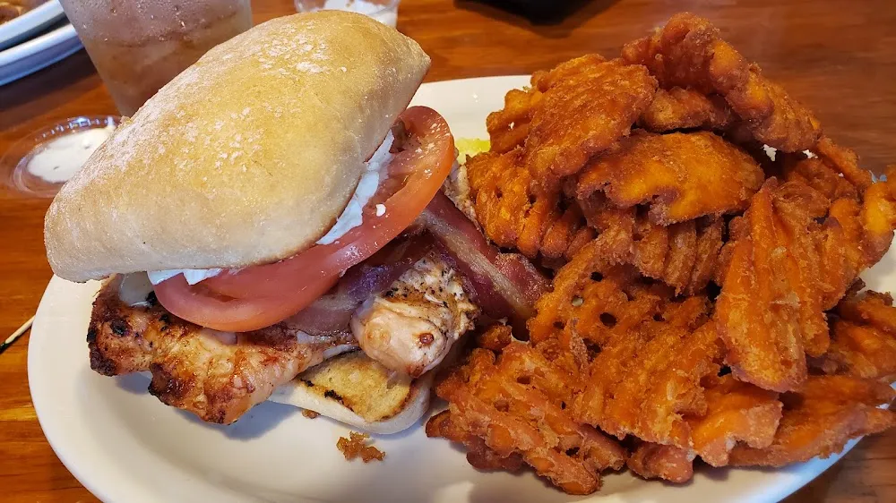 Grilled Chicken Breast with Bacon Tomato Pepper Jack Special Sauce on a Barouche Bun